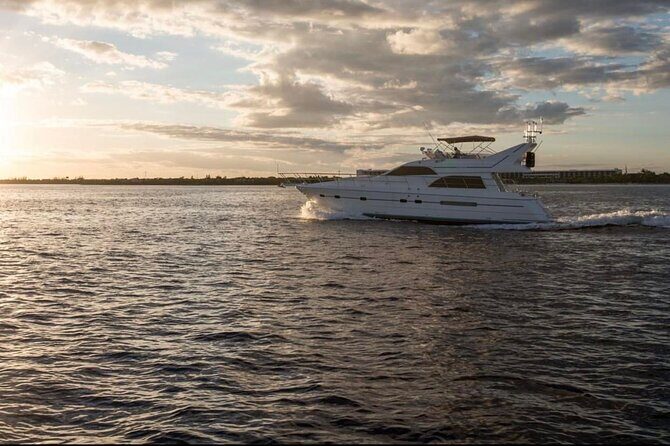 2 Hour Sunset- 60' Neptunus Tulum, Playa del Carmen, Riviera Maya - Puerto Aventuras Marina: Where the Golden Hour Turns Into a Show