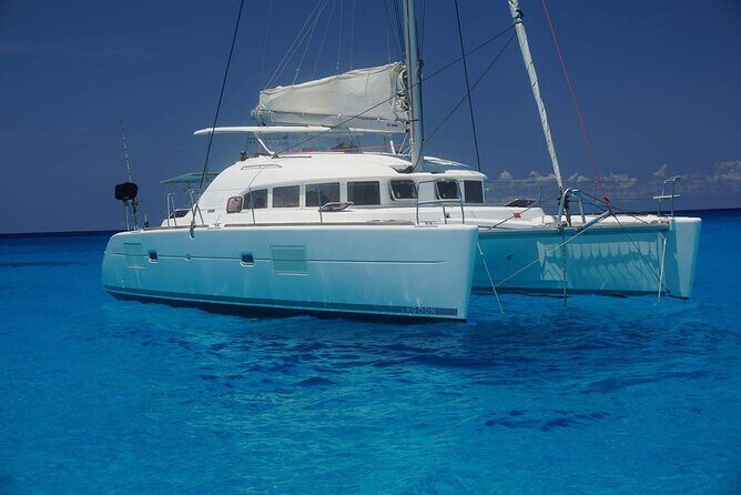 5H Private 40'Catamaran All-Inclusive in Tulum & Playa del Carmen - Stop 1 at In-Ha: calm snorkeling, sea turtles, and food while you wait your turn