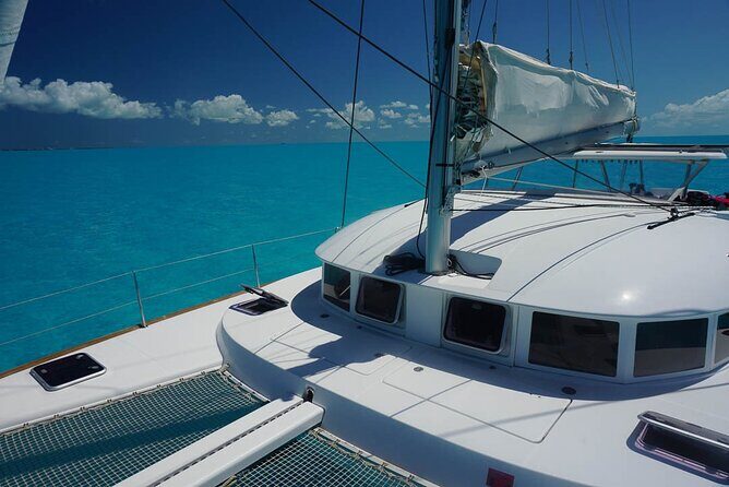 5H Private 40'Catamaran All-Inclusive in Tulum & Playa del Carmen - Stop 2 at La Bocana: shallow water, open bar, and a music-friendly finale