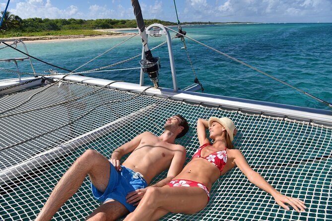 Catamaran Cruise in Riviera Maya With Snorkeling & Beach Club - Snorkeling stops: reef spotting with real guidance