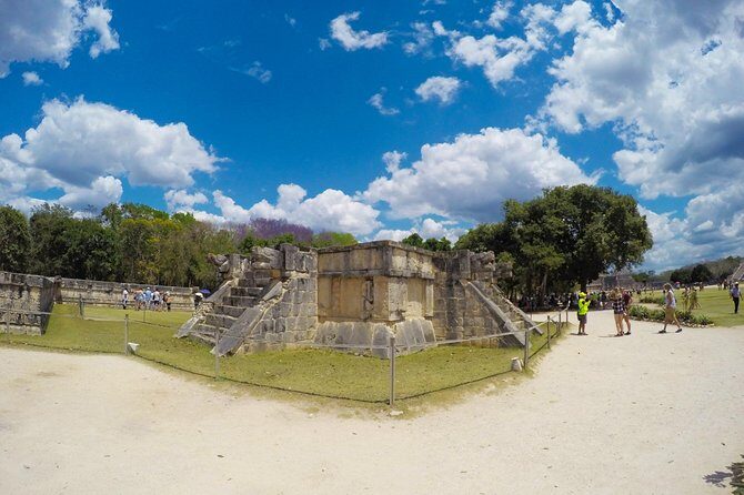 Chichen Itza Day Trip from Riviera Maya - Entering Chichen Itza: El Castillo, the ball court, and the vendor pressure