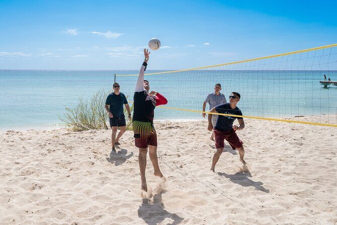 Cozumel: KUZÁ Beach Pass with Buffet, Open Bar & Activities - Live music, cultural shows, and beach games that keep the hours moving