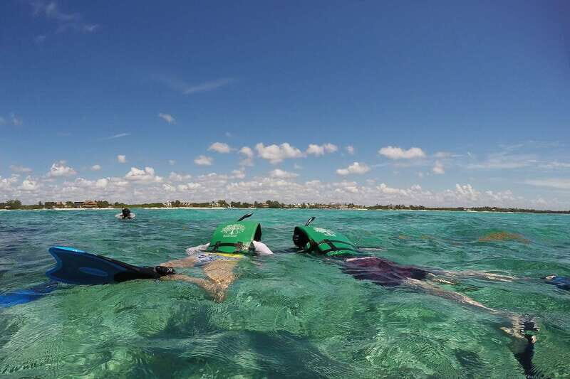 From Tulum: Sian Kaan Boat Trip Adventure with Lunch - Photo stop and swimming time: the stretch between reef and lunch