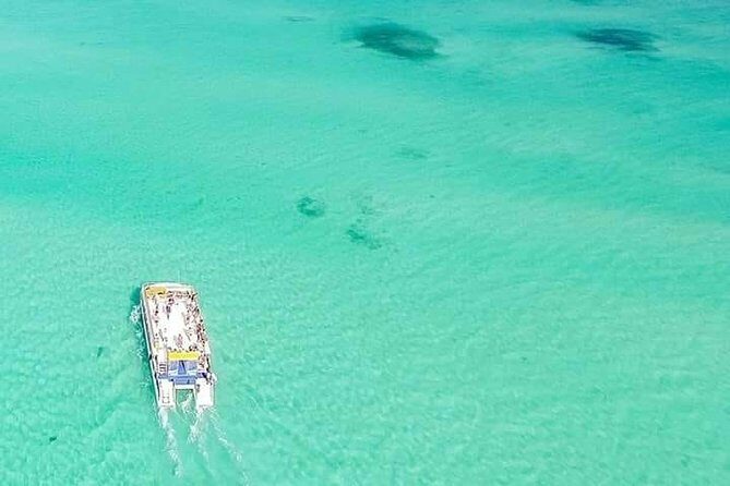 Isla Mujeres Unlimited! Fun & Party with transportation - Catamaran vibes to Isla Mujeres: what the day feels like