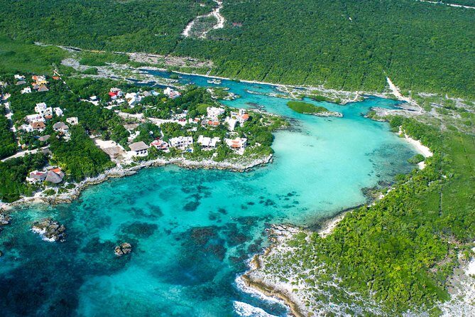 Mayan Adventure Snorkeling Tour from Cancun - Yal-ku Lagoon ocean inlet: colorful fish and easy floating