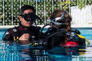 Two reef discovery dives with professional instructor (no experience necessary) - Pool Basics That Make the Ocean Feel Manageable